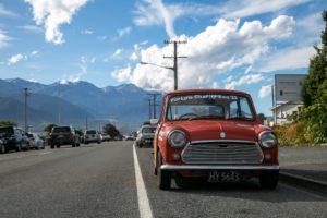 Image of a mini on the side of the road in beautiful rural new zealand, taken during the 2023 event.